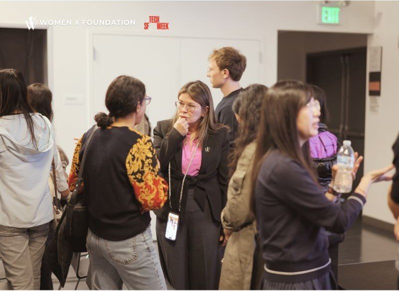 Guests talking after the panels in San Francisco