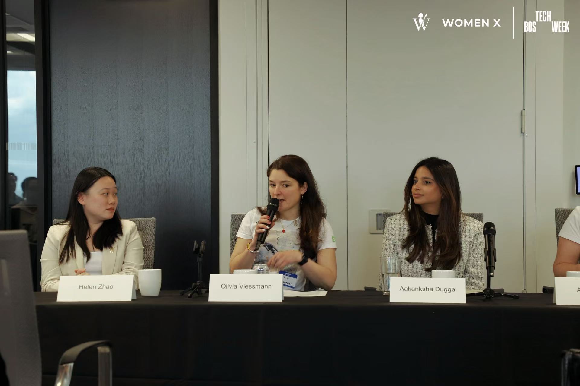 Olivia Viessmann speaking on the Women X panel